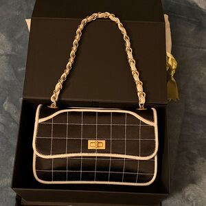 CHANEL Black and White Quilted Shoulder Bag with Gold Chain